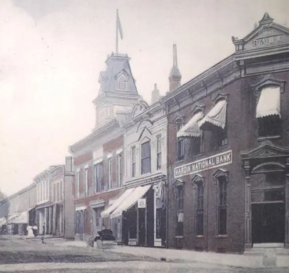 Public Domain. Elizabethtown's public square in the early 1900s. Philip Arnold came home here in 1872 with $550,000 taken from San Francisco financiers, and opened his own bank the following year.