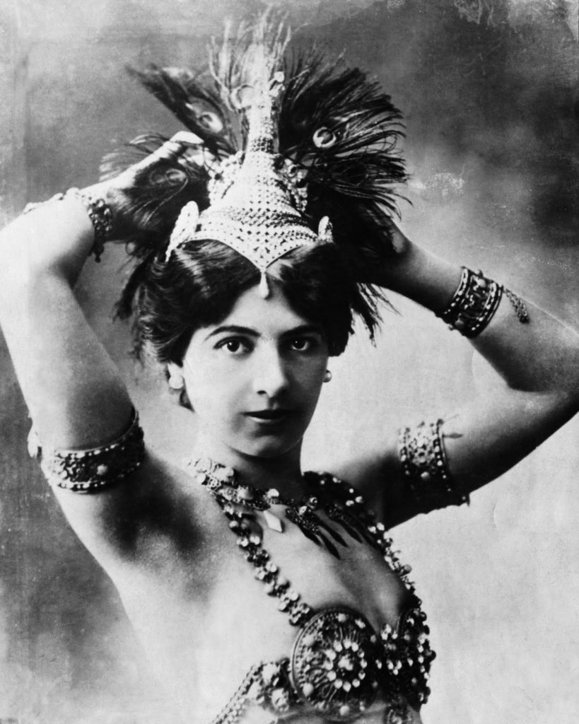 Public Domain. Mata Hari in costume, c. 1906. Her ex-husband collected photographs like this one and used them in court as evidence of bad character to keep custody of their daughter.