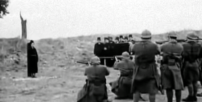 Public Domain. Long labelled as Mata Hari's execution, though no authenticated image of her death exists. She refused the blindfold at Vincennes on October 15, 1917, and blew the squad a kiss.
