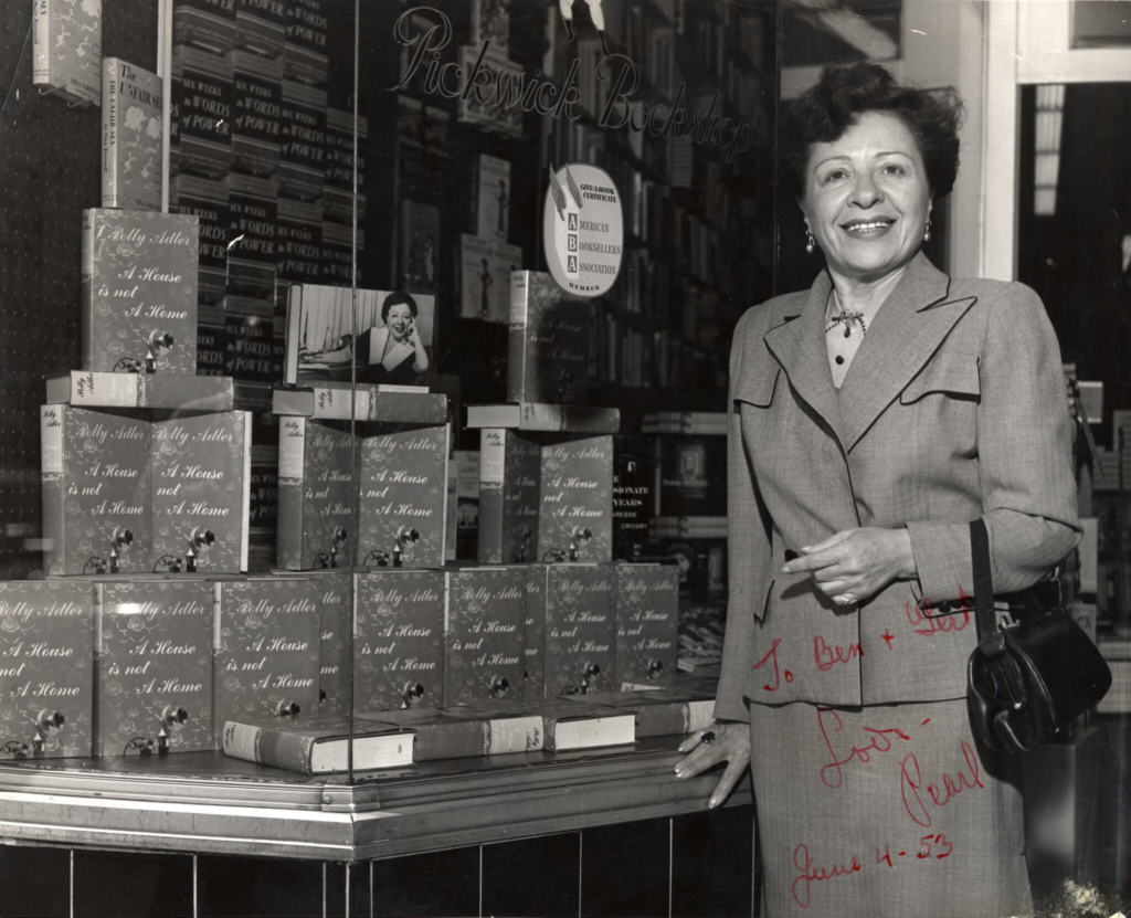 olly Adler at the Pickwick Bookshop, June 1953. Signed, smiling, and surrounded by copies of A House Is Not a Home. The woman who once bribed police to stay out of her business was now selling her story to anyone who walked in.bing images.
