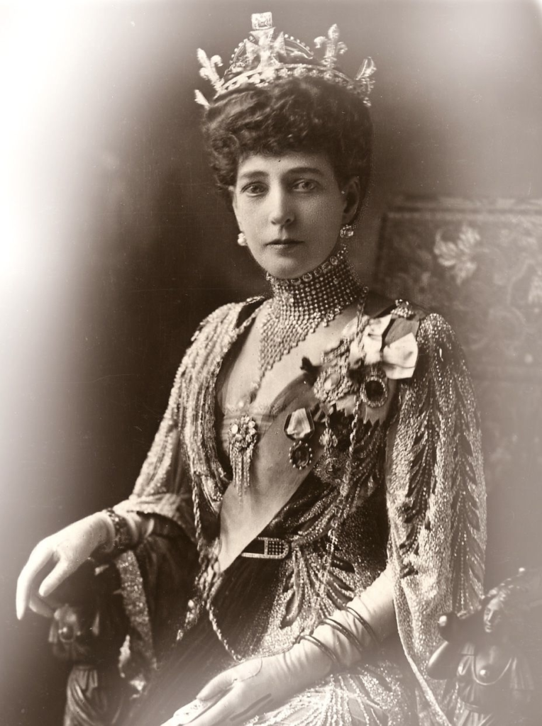 Alexandra photographed as Queen Consort after 1901. She had waited 38 years to reach this position. The choker necklace she always wore hid a childhood scar and became a fashion copied across Britain.