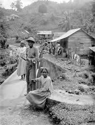 jhoenea.s.wilson An early photograph of Moore Town, built on land Nanny secured from the British in 1740. The settlement she founded has never stopped standing.