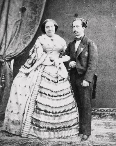 Believed to depict Queen Isabella II of Spain and her husband Francisco de Asís, photographed around 1860, fourteen years into a marriage widely described as a mutual disaster.