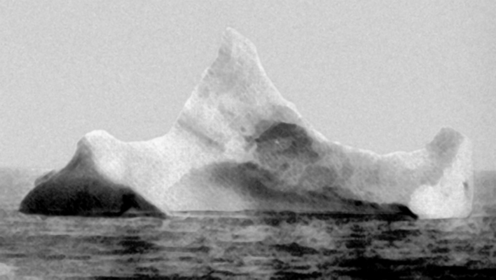 Public Domain The iceberg thought to have sunk the Titanic, photographed the morning after the collision on April 15, 1912. Six warnings had been received the day before.