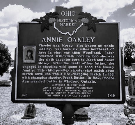 An Ohio Historical Marker near Annie Oakley's birthplace in Darke County commemorates the sharpshooter who grew up hunting wild game to feed her family. She died in 1926 having donated most of her earnings to charity, leaving almost nothing behind.
