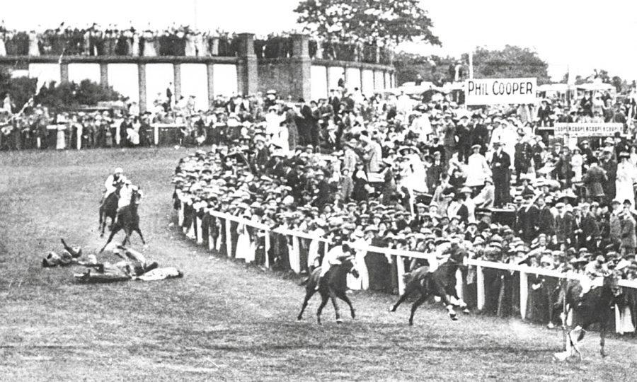 Emily Davison and jockey Herbert Jones lie on the track after being hit by the King's horse, Anmer, on June 4, 1913.